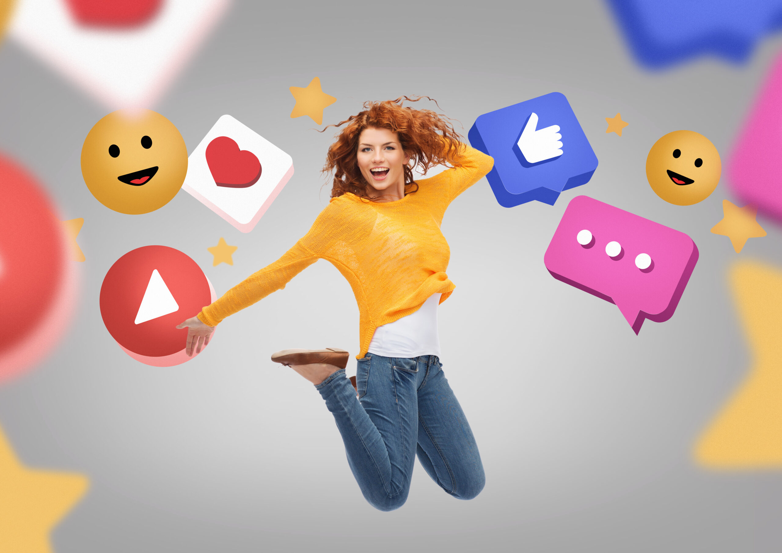 social media and people concept - smiling young woman jumping in air over internet icons on grey background